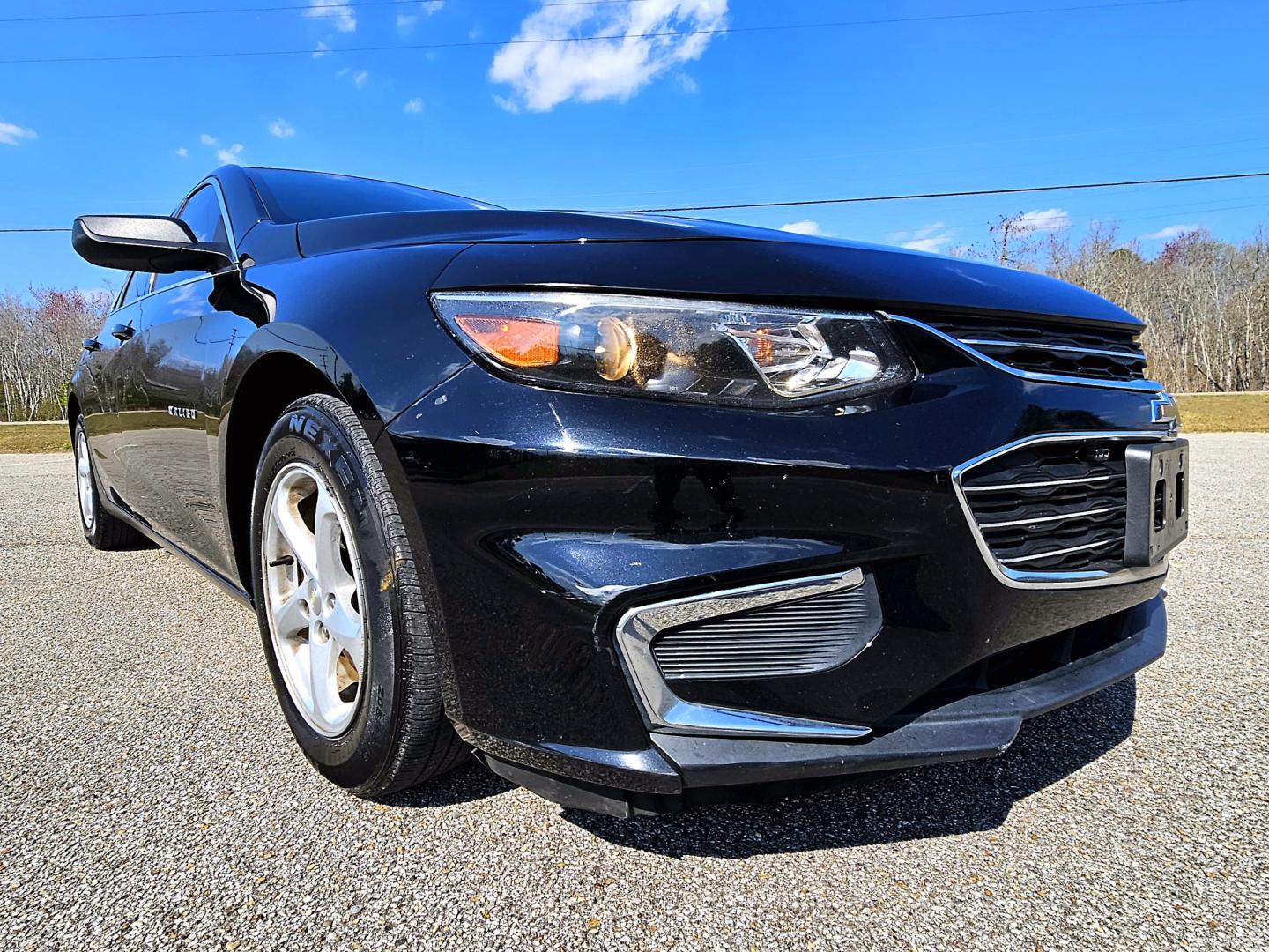 2016 Black Chevrolet Malibu LS (1G1ZB5ST4GF) with an 1.5L L4 DOHC 16V engine, 6A transmission, located at 18001 Kellogg Rd, Saucier, MS, 39574, (228) 832-1441, 139.421463, -76.641457 - Photo#2